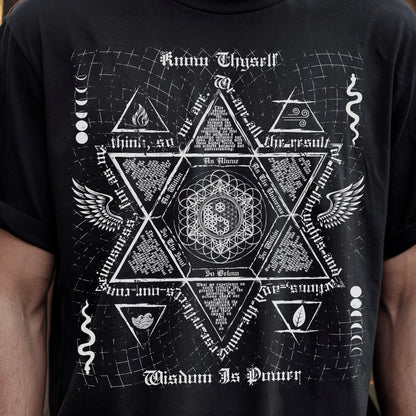 a man wearing a black t - shirt with a star of david on it